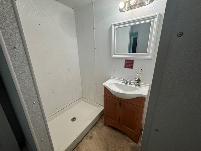 2116 S Franklin St, Kirksville, MO 63501 - full bath featuring vanity, tile patterned flooring, and a stall shower