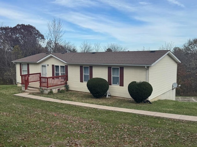 single story home with a front yard