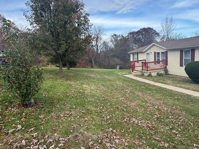 view of yard featuring a deck