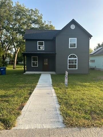 view of front facade with a front yard