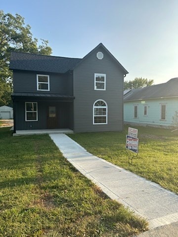 view of front of house with a front lawn