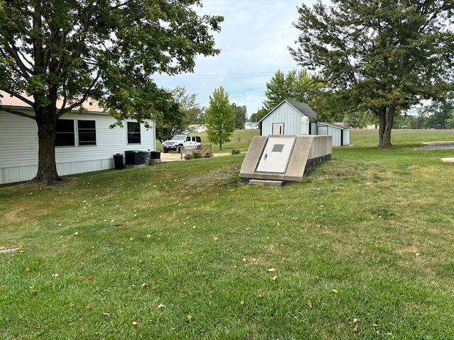 view of yard featuring central AC unit