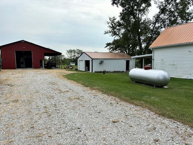 exterior space featuring an outbuilding and a carport