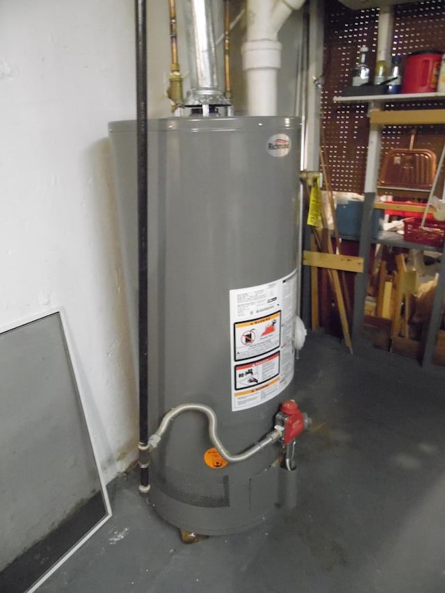 utility room with gas water heater