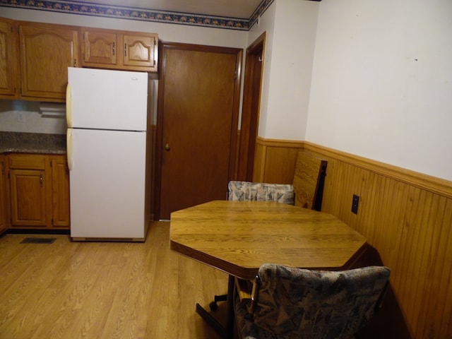 dining room featuring light wood-type flooring