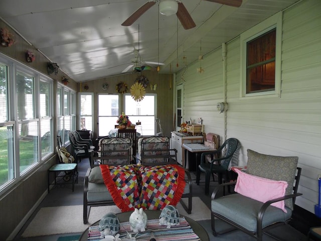 sunroom / solarium featuring ceiling fan and vaulted ceiling