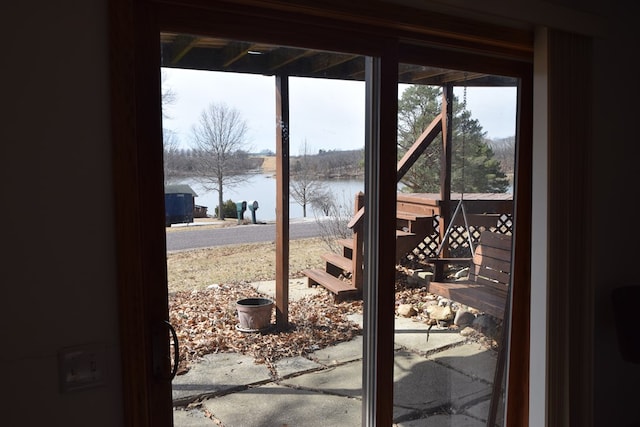 entryway featuring a water view