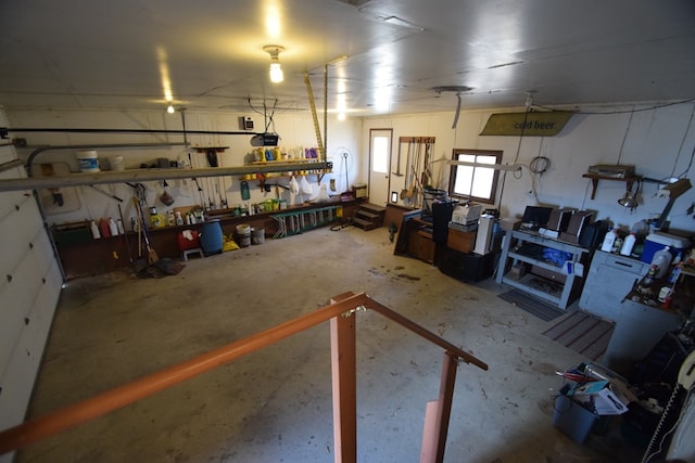 garage with a workshop area