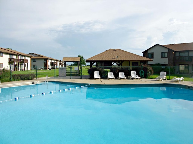 view of swimming pool with a gazebo