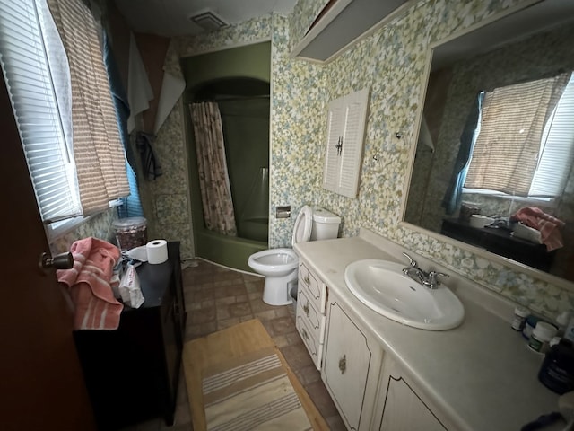 bathroom featuring toilet, shower / bath combination, visible vents, vanity, and wallpapered walls