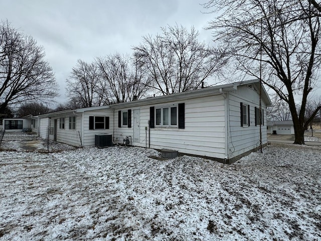 view of front of home with cooling unit