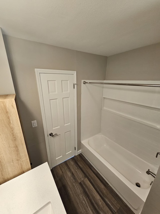 bathroom with wood-type flooring