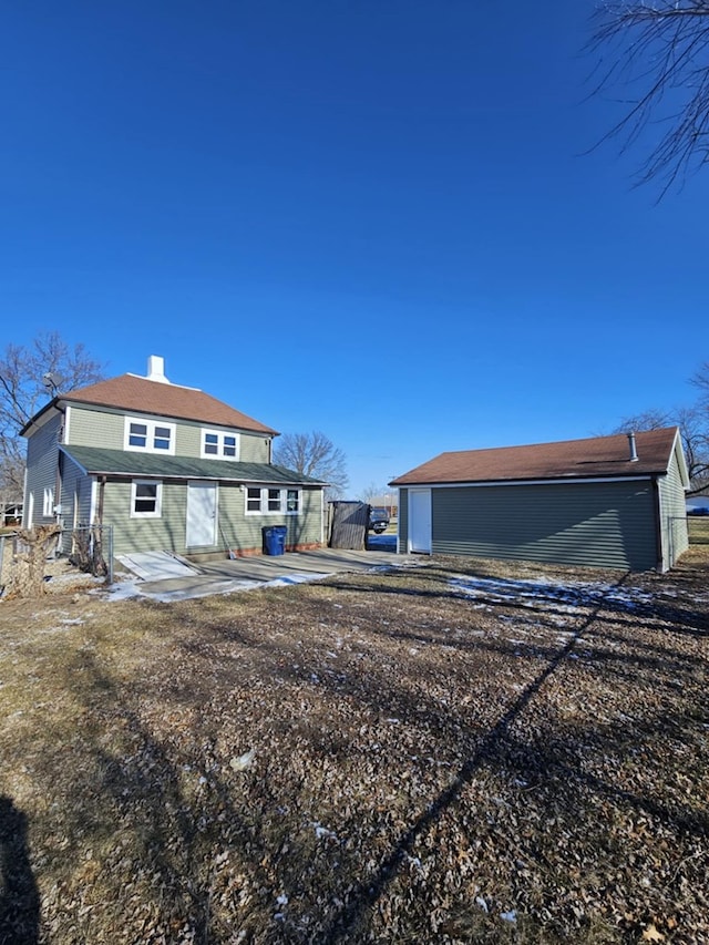 back of house with a patio area
