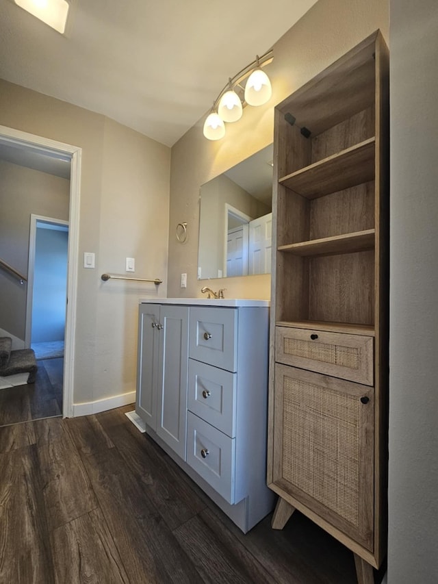 bathroom featuring vanity and wood-type flooring