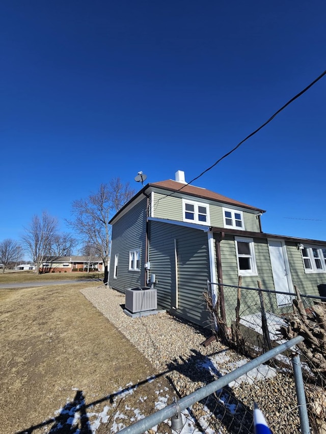 view of property exterior featuring central AC