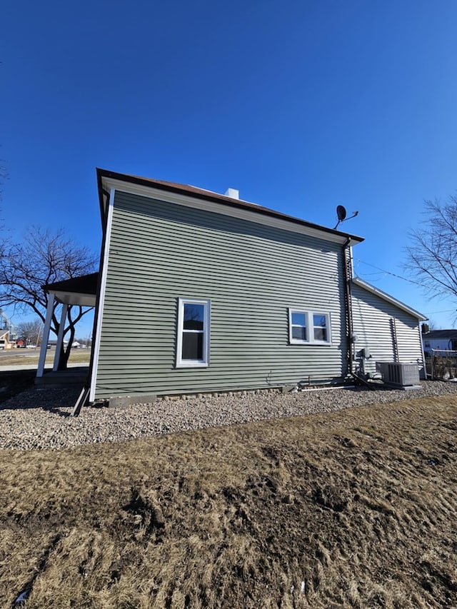 view of side of property featuring cooling unit