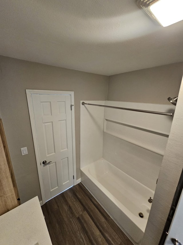 bathroom featuring wood-type flooring