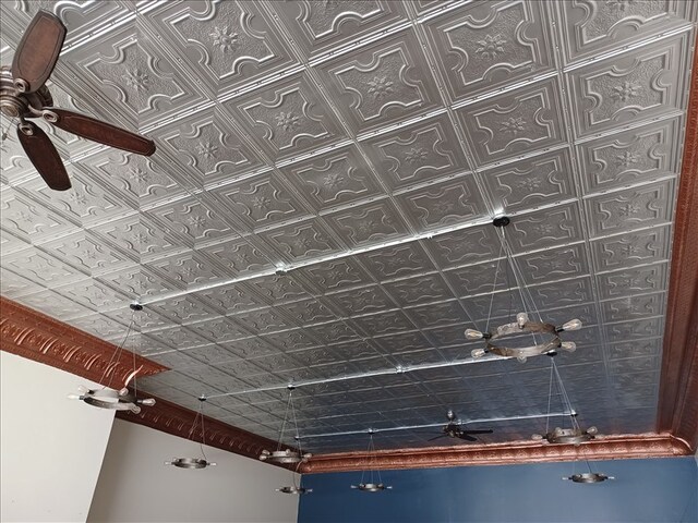 115, 117 N Rollins St, Macon, MO 63552 - details featuring a ceiling fan and an ornate ceiling