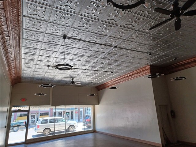 115, 117 N Rollins St, Macon, MO 63552 - interior space featuring baseboards and an ornate ceiling