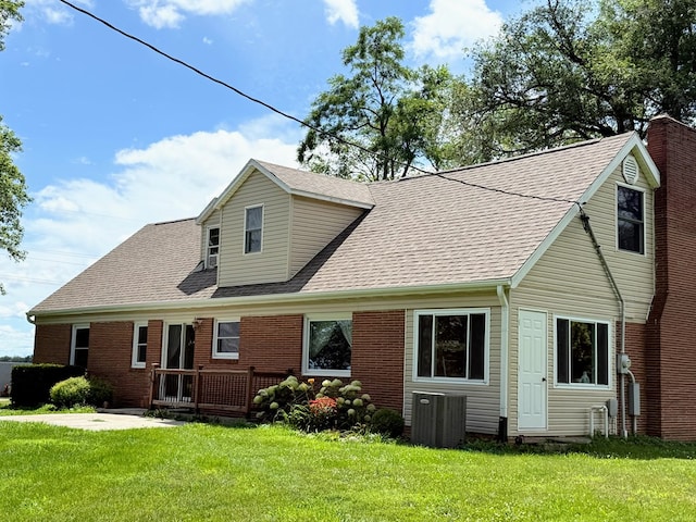 64234 Hwy 6, Green Castle, MO 63544 - rear view of house featuring a yard, roof with shingles, and brick siding