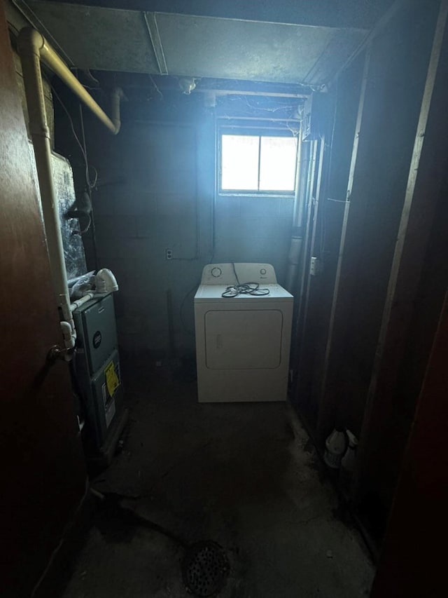 washroom with washer / clothes dryer and laundry area