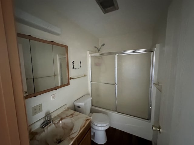 1302 Queens Ct, Kirksville, MO 63501 - bathroom featuring toilet, vanity, and shower / bath combination with glass door