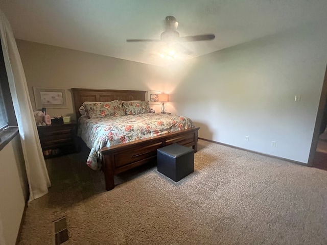 bedroom featuring visible vents, carpet, ceiling fan, and baseboards