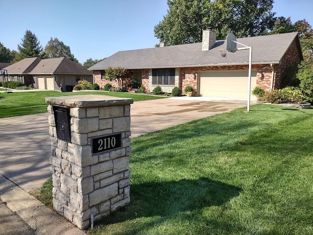 exterior details featuring a downspout, driveway, a chimney, and roof with shingles