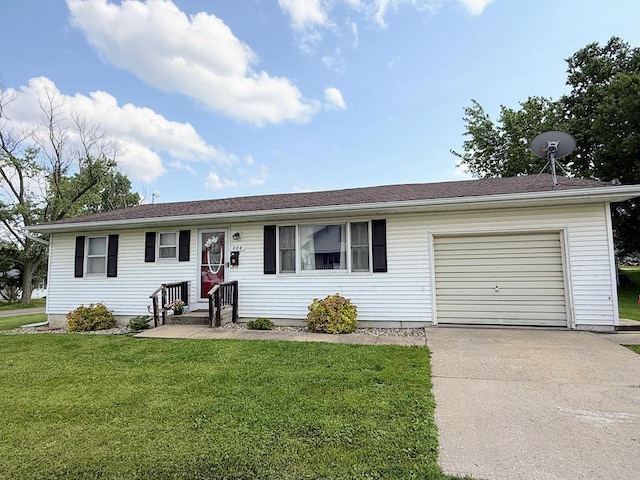 408 Clay St, Edina, MO 63537 - ranch-style home featuring a garage, concrete driveway, and a front lawn