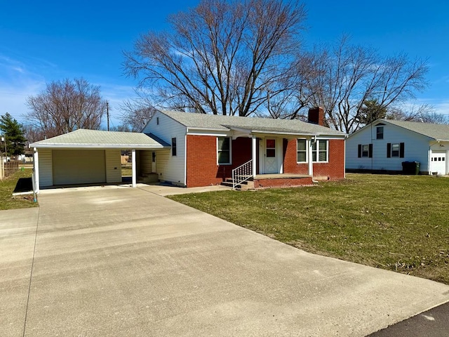 single story home featuring a front yard, driveway, an attached garage, a chimney, and brick siding