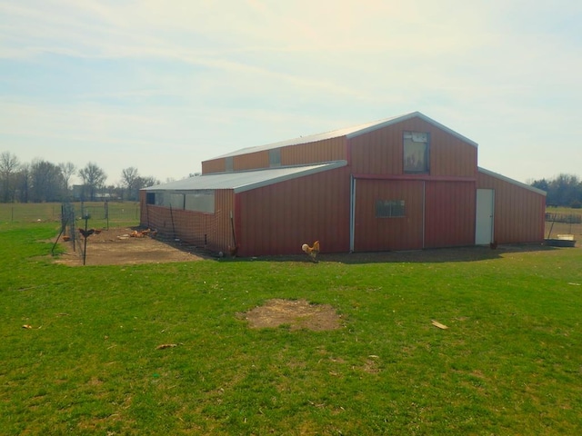 view of outdoor structure with a lawn