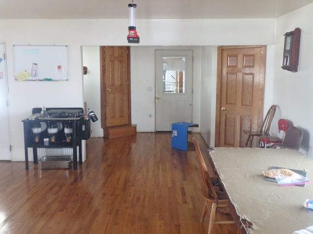 dining area with dark wood-type flooring