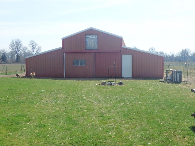 view of outdoor structure with a yard