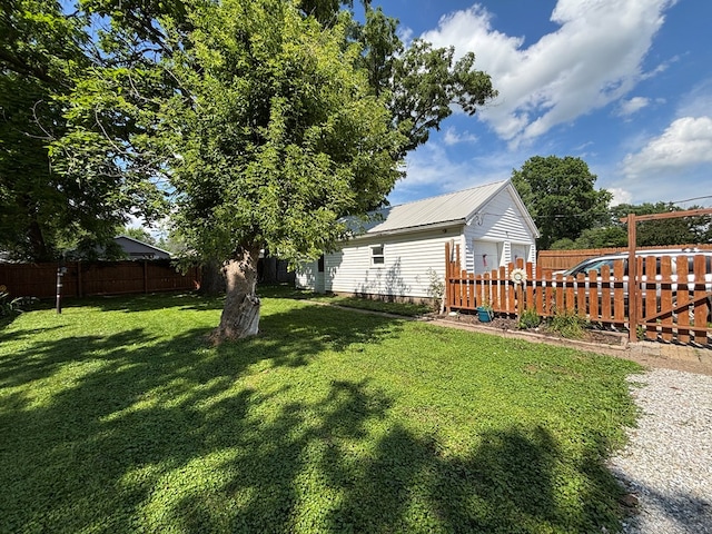 712 W Shelby, Kirksville, MO 63501 - fenced backyard with a garage