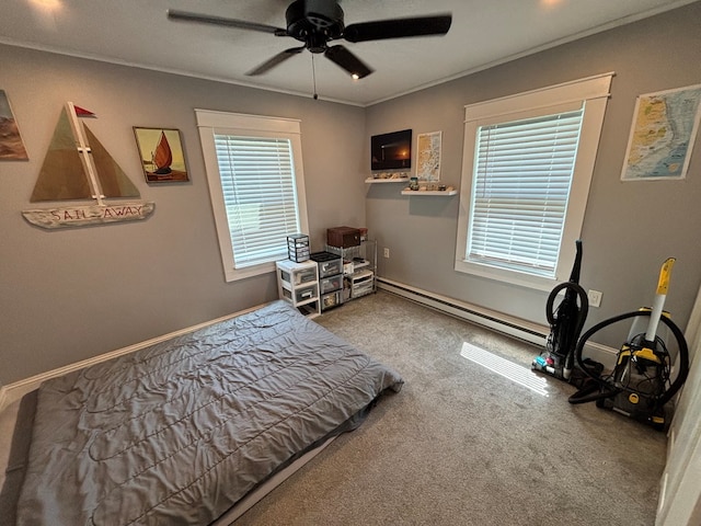 712 W Shelby, Kirksville, MO 63501 - bedroom with a baseboard radiator, carpet, a ceiling fan, and crown molding