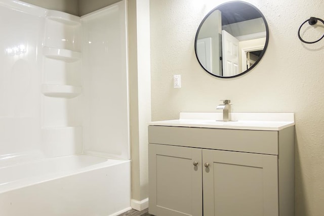 bathroom featuring vanity and bathtub / shower combination