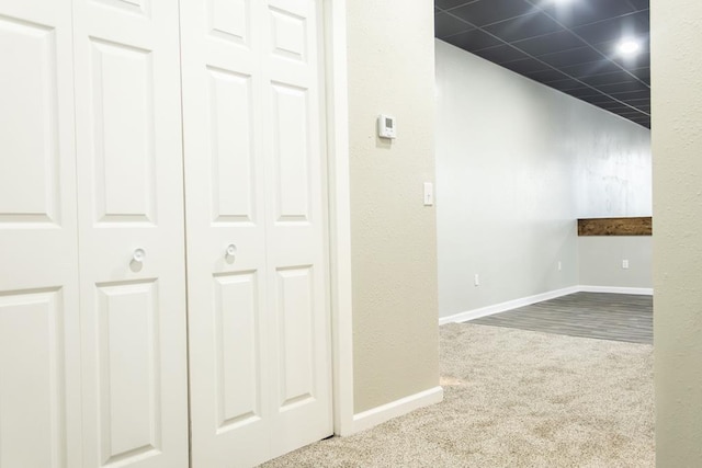 corridor featuring carpet