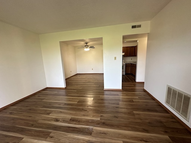 2703 Woodwinds Ct, Kirksville, MO 63501 - unfurnished room featuring ceiling fan and dark wood-type flooring