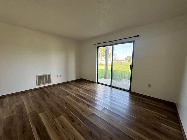 2703 Woodwinds Ct, Kirksville, MO 63501 - empty room with dark hardwood / wood-style floors