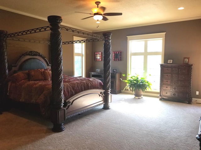 bedroom featuring crown molding and carpet flooring