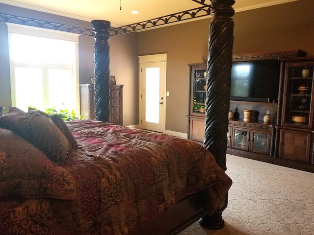 bedroom featuring crown molding