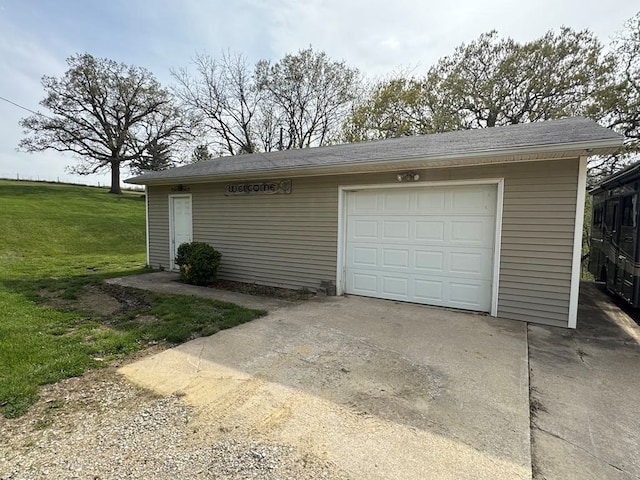 53895 E 3rd St, Milan, MO 63556 - garage featuring driveway