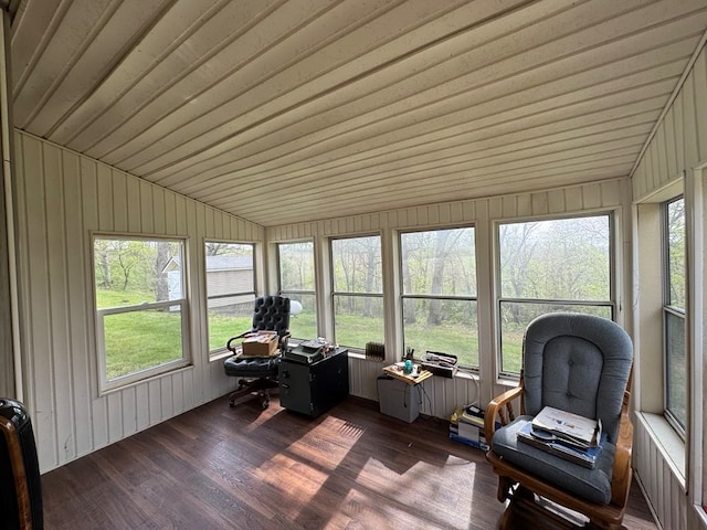53895 E 3rd St, Milan, MO 63556 - sunroom with a wooden deck, wood walls, vaulted ceiling, and wood finished floors