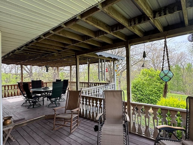 53895 E 3rd St, Milan, MO 63556 - wooden deck with outdoor dining area
