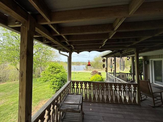 53895 E 3rd St, Milan, MO 63556 - wooden terrace featuring a lawn and a water view
