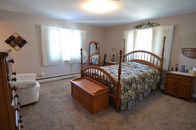 bedroom with multiple windows, a baseboard radiator, and carpet flooring