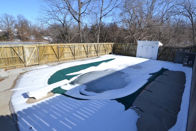 view of snow covered pool