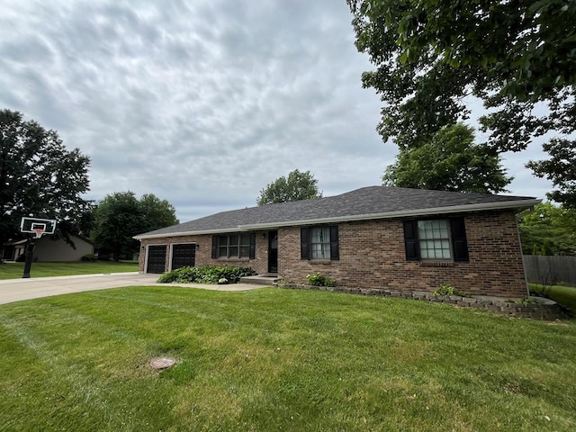 89 Tomahawk, Lexington, MO 64067 - ranch-style house featuring driveway, an attached garage, brick siding, and a front yard