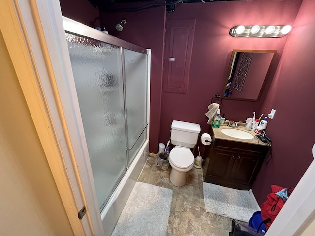 89 Tomahawk, Lexington, MO 64067 - bathroom featuring toilet, vanity, bath / shower combo with glass door, and electric panel
