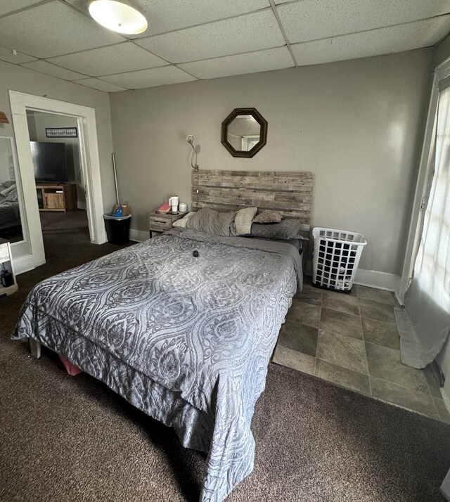 410 E Buchanan, Kirksville, MO 63501 - carpeted bedroom featuring a drop ceiling and baseboards